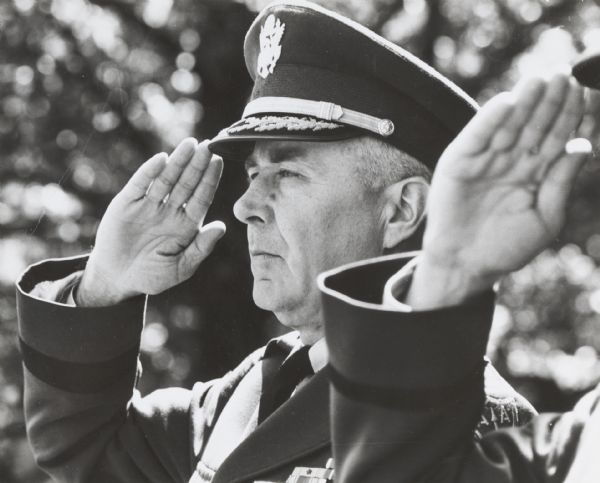News portrait of General Cardwell saluting.