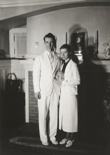 Mr. and Mrs. T.H. Millman informally posed at their home wedding.

