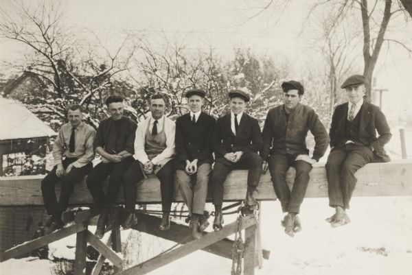 Group portrait of timber mechanics outdoors at the Forest Products Laboratory.