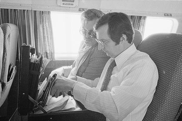 Congressman David R. Obey (right) and his home secretary Jerry Madison, also a Wausau history teacher, traveling in the district on an airplane.
