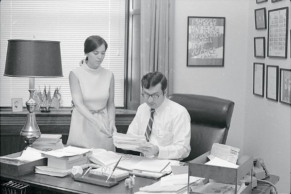 Wisconsin Congressman David R. Obey and his secretary in his office in the United States Capitol.