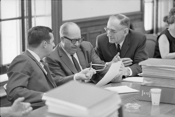 David R. Obey (left), then an Assemblyman, with Assemblyman George Molinaro and State Senator Walter Hollander photographed for a campaign brochure.
