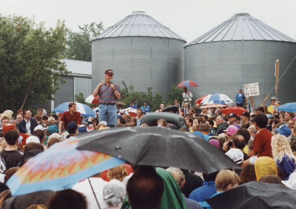 Bill Clinton (standing) and Al Gore (in the red shirt to Clinton's right) campaigning together in Wisconsin. Although the precise location is unidentified, it is in the 7th Congressional District represented by David R. Obey who is seated near Gore.