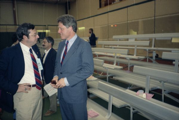 Governor Bill Clinton looking for support for his presidential ambitions at the 1987 Wisconsin Democratic convention. With him is Congressman David R. Obey.