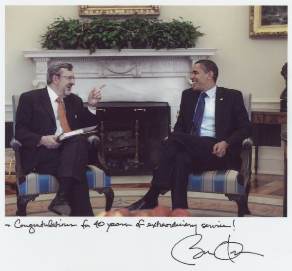 Congressman David R. Obey and President Barack Obama in the Oval Office in the White House. The photograph is autographed for Obey: "Congratulations for 40 years of extraordinary service! Barack Obama."