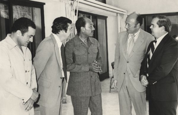 Egyptian President Anwar Sadat (center), and on far left Egyptian Vice President Hosni Mubarak, meeting with a delegation from the U.S. House of Represenatives' Foreign Operations Subcommittee that included Wisconsin Congressman David Obey (between Mubarak and Sadat) as well as Congressmen Ed Koch and Joe Early. This photograph was taken by an official Egyptian source.