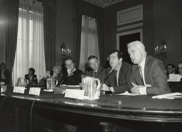 There's nothing like a threat to the fortunes of the dairy business to bring Wisconsin political leaders together. Here two Republicans and two Democrats testify before the Agriculture Committee. The Republicans, on the left, are Scott Klug and Tom Petri; the Democrats are David R. Obey and Jim Moody.