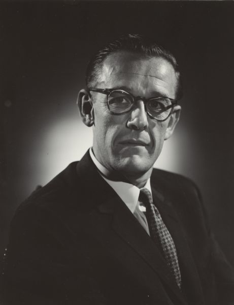 Quarter-length studio portrait of Louis Hanson, Senator Gaylord Nelson's home secretary and chairman of the Wisconsin Democratic Party.