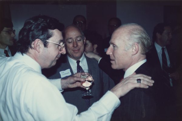 Wisconsin Congressman David R. Obey (left) and Wisconsin Senator Herb Kohl at a fundraiser for Obey. Jim Chapman is the man between them.
