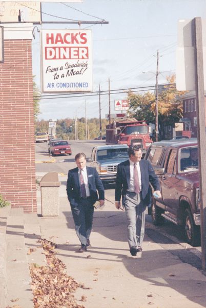 Congressman David R. Obey (right) hits the pavement in Marathon with aide Tom Springer. Hack's Diner, run by Alfred Hack, was a popular local hangout.