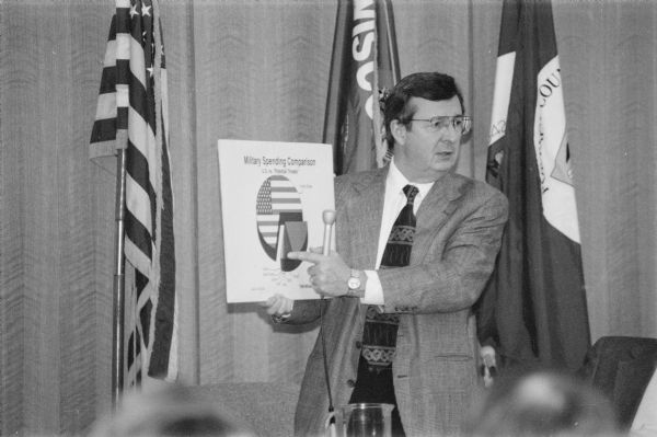 During his meetings with constituents Congressman David R. Obey of Wisconsin often used charts and graphs to make his points about public policy issues. Here he was talking about military spending to a Stevens Point audience.