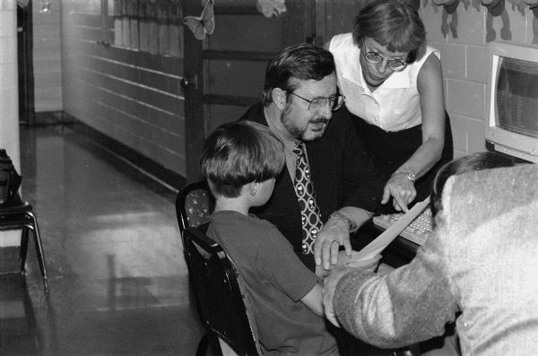 As part of his support for education, Congressman David Obey visited many schools within his district. Here he observed elementary school students in Wisconsin Rapids and the use being made of instructional computers.
