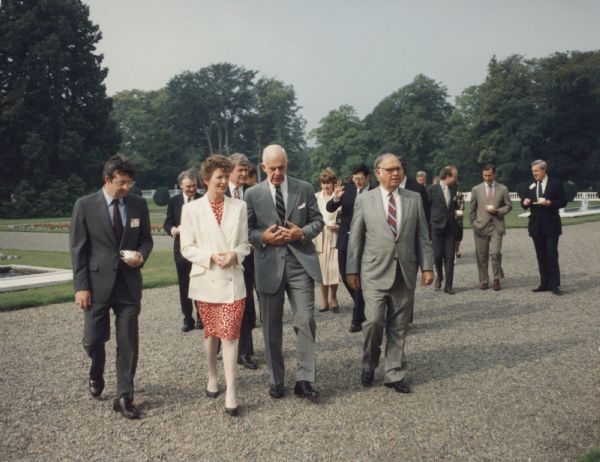 Mary Robinson, President of Ireland, escorting Speaker of the House of Representative Thomas Foley, who was heading a house leadership trip to Ireland. To the President's right is Congressman David R. Obey of Wisconsin. The man to Foley's right is Congressman Joe Moakley.
