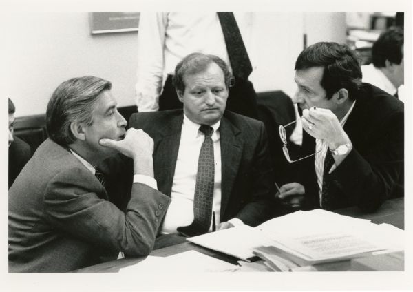 Congressman David R. Obey, chair of the Foreign Operations Subcommittee of the House Appropriations Committee, discussing foreign policy issues with Terry Peel and Mickey Edwards.
