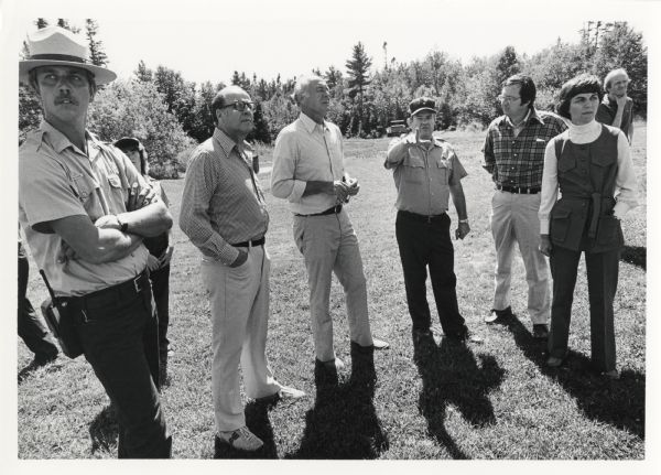 David and Joan Obey (right) with Senator Gaylord Nelson (2nd from left) and Secretary of the Interior Cecil Andrus (on Nelson's left) on an Apostle Islands Tour given by National Park Rangers.