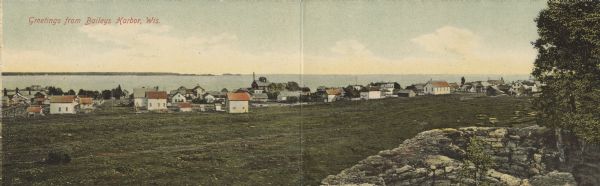Colorized panoramic view of businesses and dwellings along the shore of Lake Michigan. A rock formation and a tree in the lower right. Caption reads: "Greetings from Bailey's Harbor, Wis."