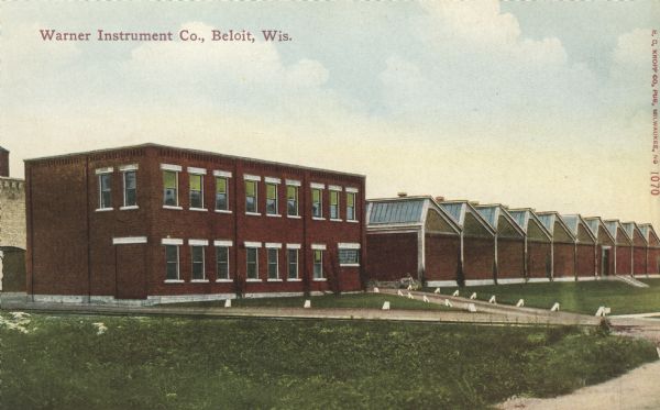 Exterior view of the factory. Caption reads: "Warner Instrument Co., Beloit, Wis."