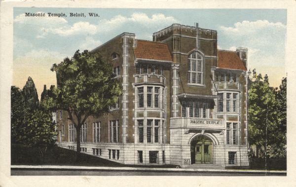 Exterior view of the masonic temple, a large brick and stone building with an arched entrance. Caption reads: "Masonic Temple, Beloit, Wis."