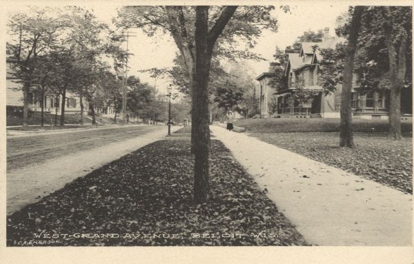 Photographic postcard view of a street in a residential neighborhood with large houses with porches. Caption reads: "West Grand Avenue, Beloit, Wis."