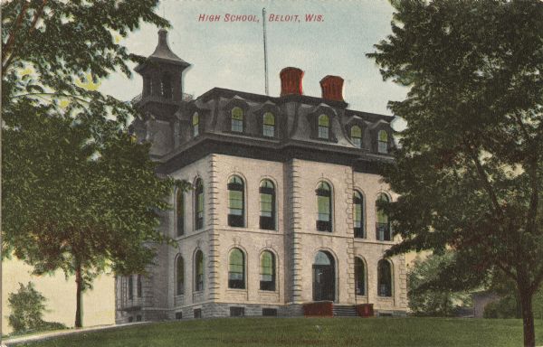 Colorized postcard view of the high school, with an arched entrance and windows. Caption reads: "High School, Beloit, Wis."