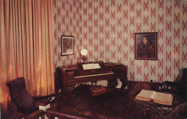 Color postcard of the parlor in the Nelson Dewey Home featuring the old square piano in the corner.