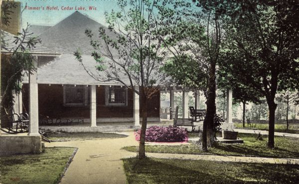 Hand-colored view of Timmer's Hotel and grounds. Caption reads: "Timmer's Hotel, Cedar Lake, Wis."