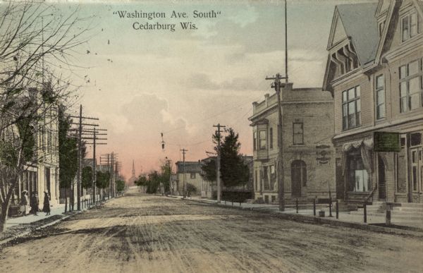 Hand-colored view down center of Washington Avenue, facing south, towards a church building on the horizon. The street is lined with sidewalks, buildings and dwellings. Three women are standing on the sidewalk on the left. Caption reads: "Washington Ave. South, Cedarburg, Wis."
