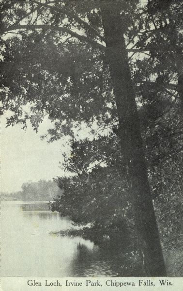 Black and white photographic view of the dam at Glen Loch, Irvine Park. Caption reads: "Glen Loch, Irvine Park, Chippewa Falls, Wis."