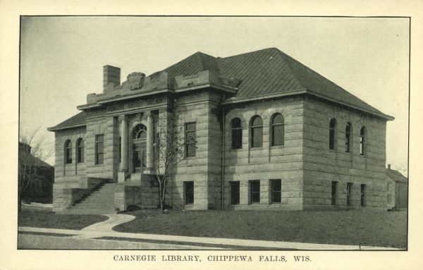 View across street towards the library, constructed of cut stone, one-story with raised basement. Caption reads: "Carnegie Library, Chippewa Falls, Wis."