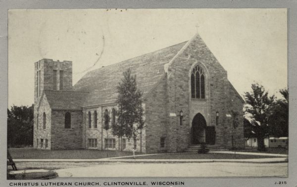 View across street towards the Christus Lutheran Church. Caption reads: "Christus Lutheran Church, Clintonville, Wisconsin."