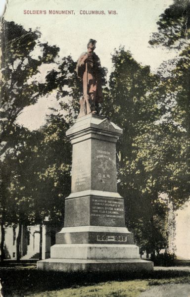 Color-enhanced black and white photographic postcard of the Soldier's Monument in honor of the Grand Army of the Republic during the Civil War. Caption reads: "Soldier's Monument, Columbus, Wis."Caption reads: ", Wis."