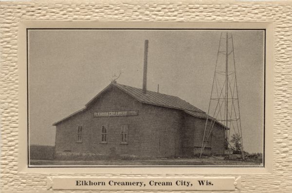Photographic postcard view of the Elkhorn Creamery building.