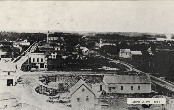 Reprint of a postcard of an aerial view from 1911, done for the Crivitz Centennial. Caption reads: "Crivitz, WI — 1911."