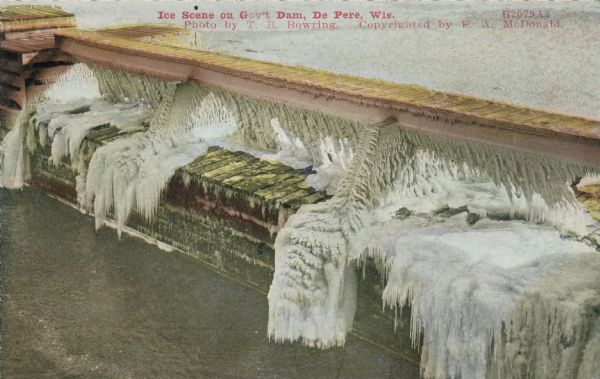 Elevated view of ice on dam. Caption reads: "Ice Scene on Gov't Dam, De Pere, Wis."
