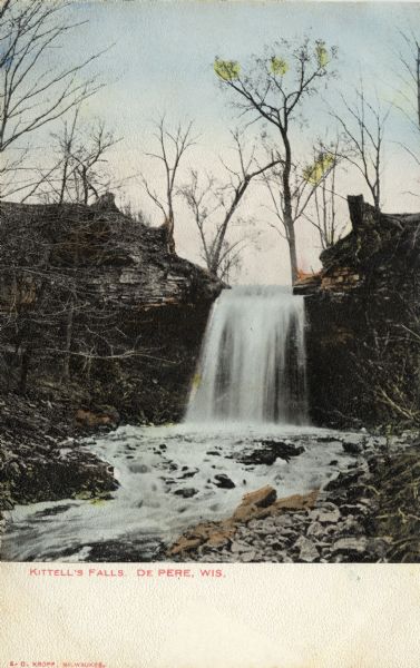 View looking up to the falls. Caption reads: "Kittell's Falls, De Pere, Wis."