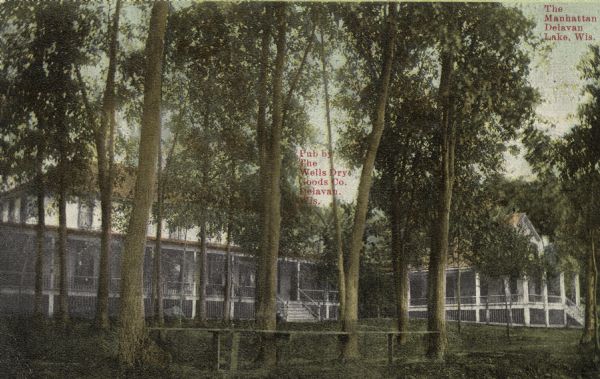 View of the Manhattan Resort and its tree-filled grounds. Caption reads: "The Manhattan, Delavan Lake, Wis."