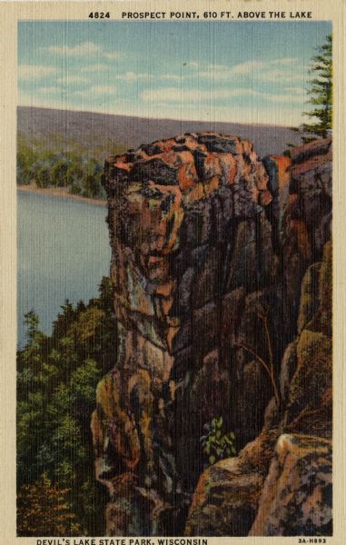 Colorized postcard of an elevated view of the rock formation near Devil's Lake. Caption at top reads: "Prospect Point, 610 FT. Above the Lake." Caption at bottom reads: "Devil's Lake State Park, Wisconsin."