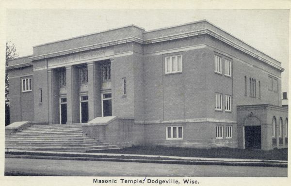 View from street of the Masonic Temple. The carved sign above the entrance reads: "Temple of Freemasonry." Caption reads: "Masonic Temple, Dodgeville, Wisc."