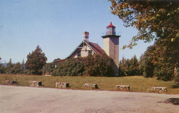 Color photographic postcard view of the Eagle Lighthouse in Peninsula State Park.