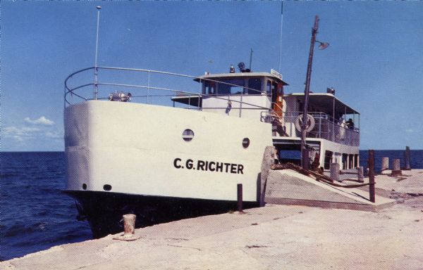 Color photographic postcard view of the "C.G. Richter" at the dock, a ferry operating between mainland Door County and Washington Island.