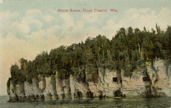 View across water towards the bluffs at the northern end of Door County.