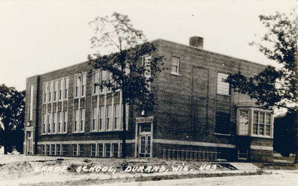 View from street of the Grade School building. Caption reads: "Grade School, Durand, Wis."