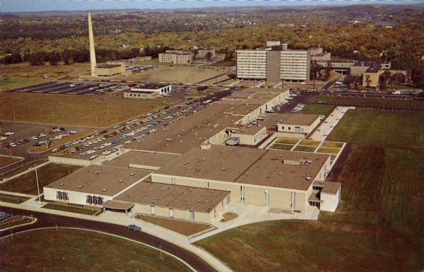 Aerial view of Eau Claire Vocational, Technical and Adult School campus.  Postmark is May 4, 1982. Mailed to U.S. Representative David Obey in Washington, D.C. from Frank Csongedi, 1521 Fenwich Ave., Eau Claire, Wis. 54701. Message reads: "David:  Help! We need you to 'go to bat' for us students. We desperately need student loans & grants to continue. It's my only chance to get an education and for self-support."