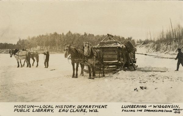 Reproduction by the Museum and Local History Department of the Eau Claire Public Library of a black and white photograph of a lumbering crew filling the sprinkling tank on a horse-drawn sled on an ice covered body of water, probably near Eau Claire.