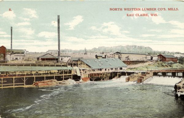 Colorized postcard view across river towards the North Western Lumber Company's mills. Caption reads: "North Western Lumber Co's. Mills, Eau Claire, Wis."