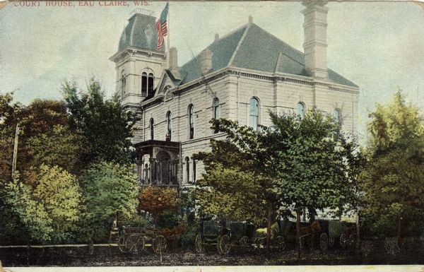 Colorized view of the courthouse behind several trees. A flag is flying above the entrance, and horse-drawn buggies are parked in front. Caption reads: "Court House, Eau Claire, Wis."