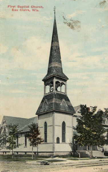 View from intersection of the bell tower and steeple of the First Baptist Church on a street corner. The entrance on the right is obscured by trees. Caption reads: "First Baptist Church, Eau Claire, Wis."