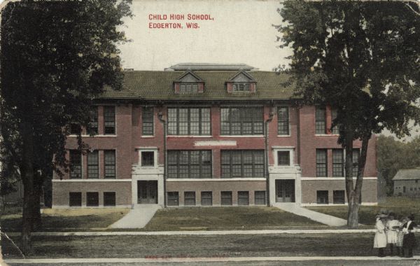 Front entrance to Child High School. A group of children are standing near the curb on the right. Caption reads: "Child High School, Edgerton, Wis."