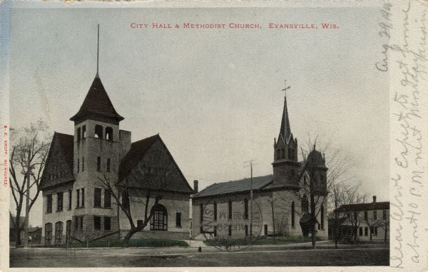 View of the city hall and church. Both buildings have bell towers. Caption reads: "City Hall and Methodist Church, Evansville, Wis."