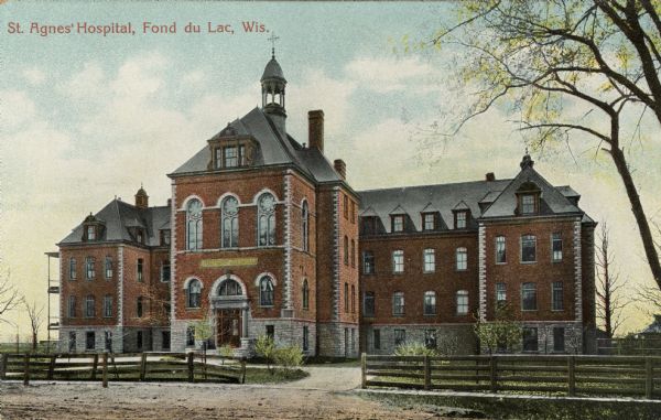 St. Agnes Hospital — a three-story stone and red brick building with a bell tower. Caption reads: "St. Agnes' Hospital, Fond du Lac, Wis."